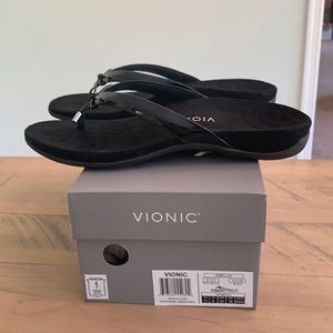 Black patent flip flops